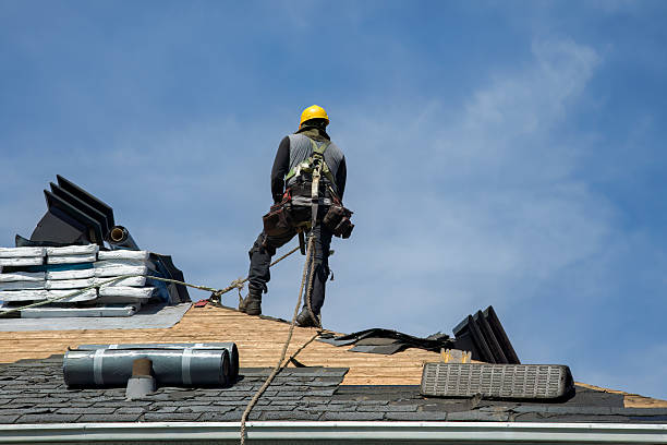 Professional Roofing technician working in Chatham, NY